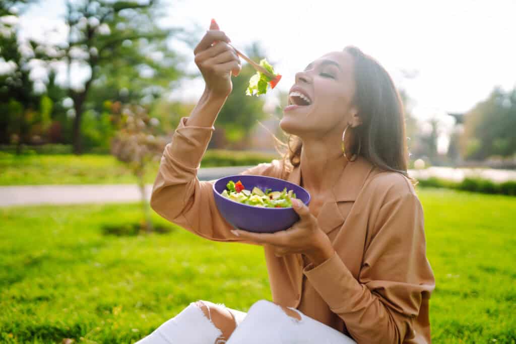 a woman eating her lunch calmly