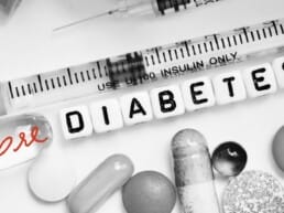 pills and syringe with Prediabetes written across them